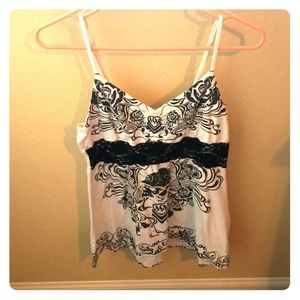 Must be sold by 8/10/18! Metal Mullisha Tank top!